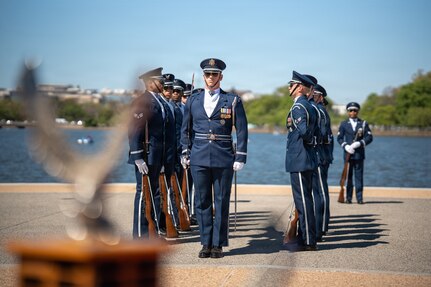 U.S. Air Force Capt. Andrew Paquin, center, ceremonial operations officer in charge of the U.S. Air Force Honor Guard Drill team, completes a walkthrough sequence with the Drill Team during the Joint Service Drill Exhibition at the Jefferson Memorial, Washington, D.C., April 11, 2026. Military drill teams from all U.S. military services performed while being evaluated on factors such as military bearing, precision, and crowd interaction. The U.S. Air Force Honor Guard Drill Team won the annual exhibition for the first time in 14 years. (U.S. Air Force courtesy photo)
