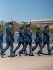 Members of the U.S. Air Force Honor Guard Drill Team march in formation during the Joint Service Drill Exhibition at the Jefferson Memorial, Washington, D.C., April 11, 2026. Military drill teams from all U.S. military services performed while being evaluated on factors such as military bearing, precision, and crowd interaction. The U.S. Air Force Honor Guard Drill Team won the annual exhibition for the first time in 14 years. (U.S. Air Force courtesy photo)