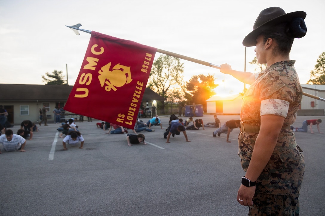 U.S. Marine Corps Sgt. Julisa Leon, a drill instructor with Marine Corps Recruit Depot Parris Island, instructs poolees with Recruiting Station Louisville, 4th Marine Corps District, during a statewide annual pool function in Richmond, Kentucky, April 10, 2026. The purpose of the pool function was to build camaraderie and healthy competition while preparing poolees for the mental and physical rigors of recruit training. Leon is a native of California. (U.S. Marine Corps photo by Cpl. Allegra Catalan-Dyson).