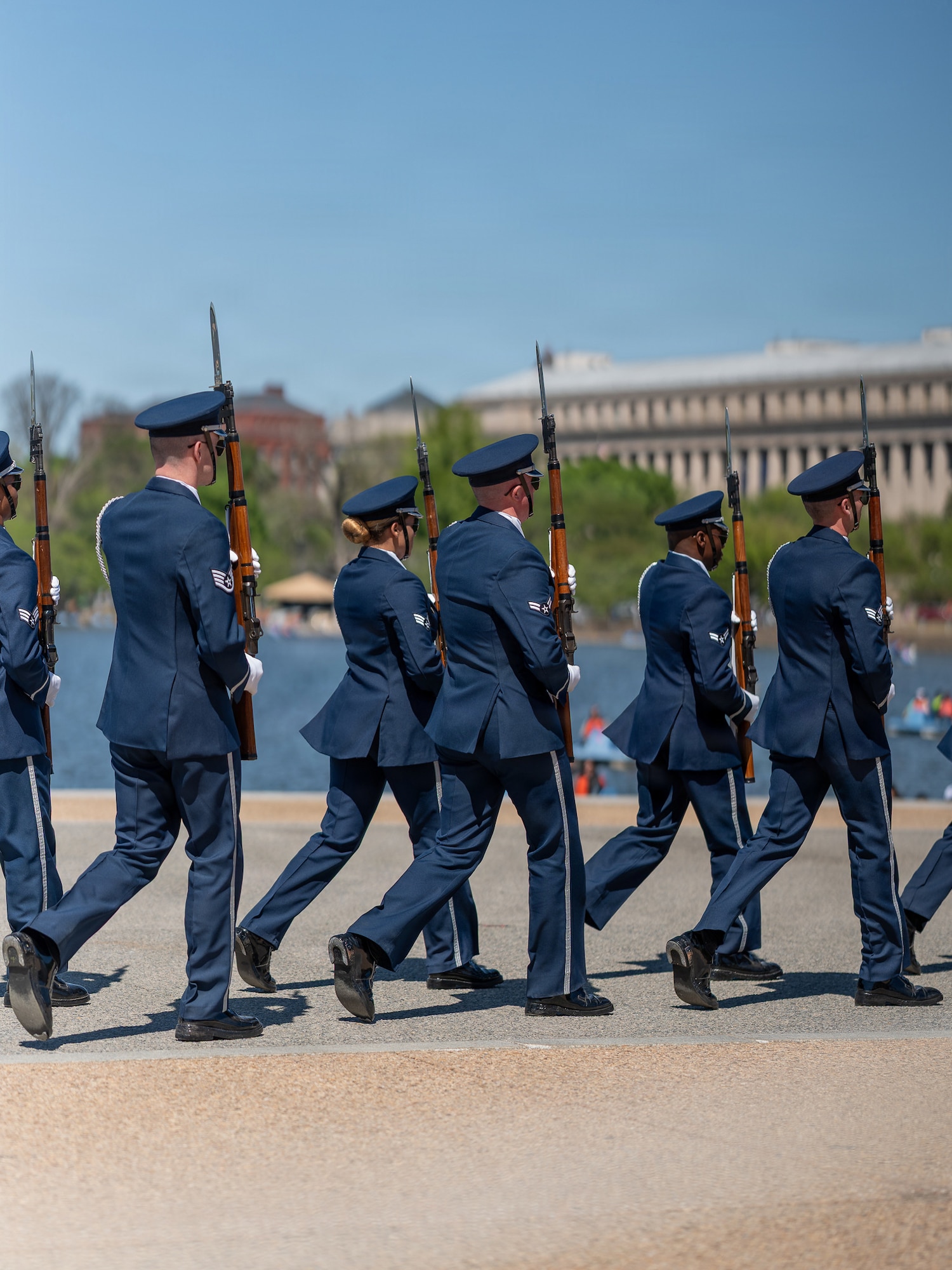 Members of the U.S. Air Force Honor Guard Drill Team march in formation during the Joint Service Drill Exhibition at the Jefferson Memorial, Washington, D.C., April 11, 2026. Military drill teams from all U.S. military services performed while being evaluated on factors such as military bearing, precision, and crowd interaction. The U.S. Air Force Honor Guard Drill Team won the annual exhibition for the first time in 14 years. (U.S. Air Force courtesy photo)