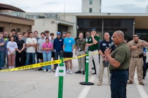 Keith Muncey, San Angelo Regional Airport deputy director, briefs participants prior to a joint emergency response exercise at Mathis Field, San Angelo Regional Airport, San Angelo, Texas, April 15, 2026. The exercise brought together military members, local agencies and civilian volunteers to strengthen interagency coordination during simulated incidents. (U.S. Air Force photo by Senior Airman James Salellas)