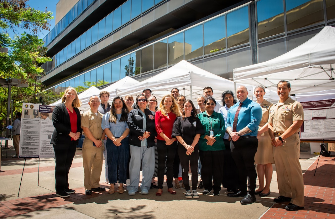 Members of the Clinical Investigation Department at Naval Medical Center San Diego pose for a group photo during the 41st Academic Research Competition and Innovation Day at NMCSD, April 10. NMCSD employs more than 5,500 active-duty military personnel, civilians, and contractors in Southern California to deliver exceptional care afloat and ashore. (U.S. Navy photo by Mass Communication Specialist 1st Class Marcus L. Stanley)