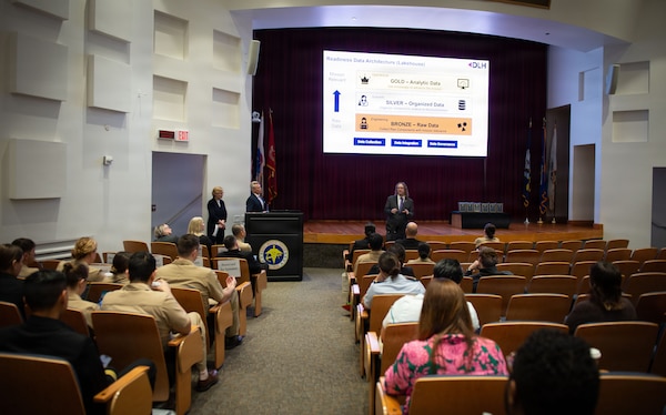 Dr. Nathaniel McNeil, Data Engineer and Research Scientist for DLH, Dr. Vicki Hart, Director of Epidemiology & Biostatistics and Strategic Account Executive for Science, Research and Development for DLH, and John Lamberton, Healthcare Practice Leader for DLH and retired U.S. Navy captain, serve as keynote speakers during the 41st Academic Research Competition and Innovation Day at Naval Medical Center San Diego, April 10. NMCSD employs more than 5,500 active-duty military personnel, civilians, and contractors in Southern California to deliver exceptional care afloat and ashore. (U.S. Navy photo by Hospital Corpsman 2nd Class Brittany Omana-Mendoza)