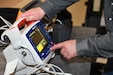 Frank Cali, a biomedical equipment technician with U.S. Army Medical Logistics Command, performs maintenance checks on a patient monitor April 1 during a support visit to the 224th Medical Company (Area Support), Maryland National Guard, near Gaithersburg, Maryland.