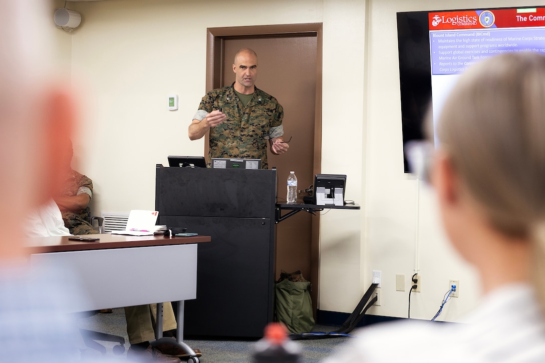 U.S. Marine Corps Lt. Col. Beau Pillot, operations director at Blount Island Command, discusses equipment maintenance, distribution and prepositioning April 15 at Marine Corps Support Facility Blount Island, Florida. Dozens of senior leaders from 2nd Marine Logistics Group participated in a conference hosted by Marine Corps Logistics Command, focused on strengthening a shared understanding of mission, structure, capabilities and innovation efforts, while building relationships to enhance warfighter support. (U.S. Marine Corps photo by Dustin Senger)