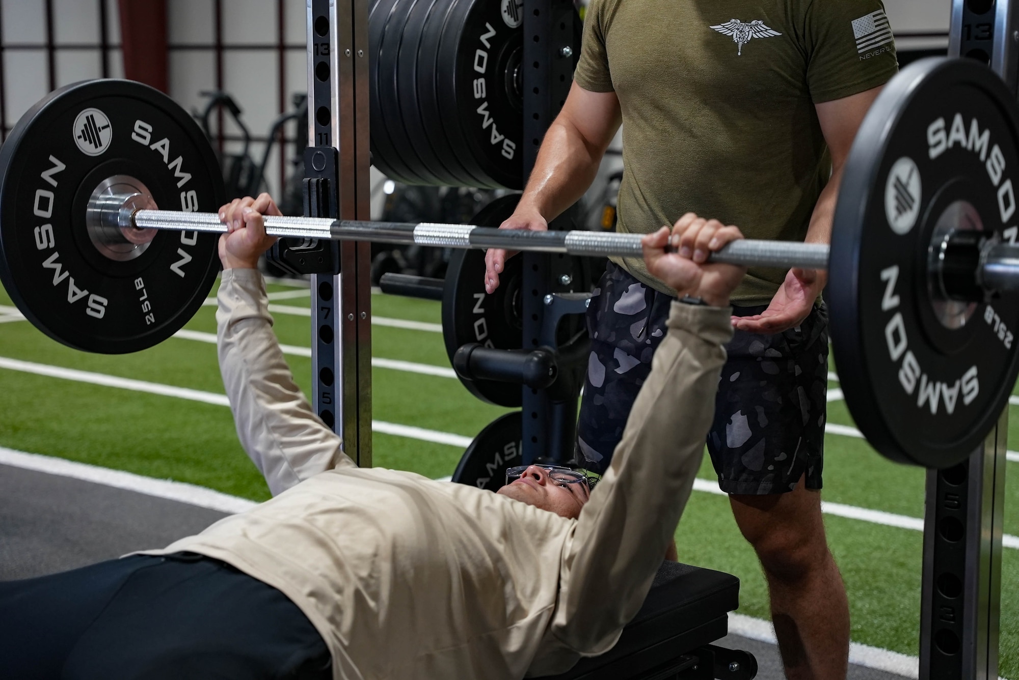 Air Commandos assigned to the 27th Special Operations Wing participate in strength training as part of their preparation to become Steadfast Fitness Ambassadors at Cannon Air Force Base, New Mexico, April 9, 2026. Ambassadors act as force multipliers, extended the reach of the Integrated Resilience Optimization Network beyond formal staff and providers. (U.S. Air Force photo by Airman Reagan Stout)