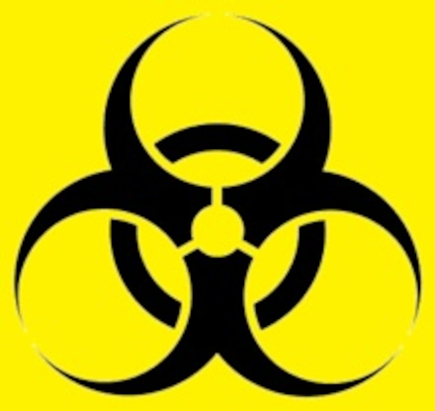 A black biohazard symbol in front of a yellow background.