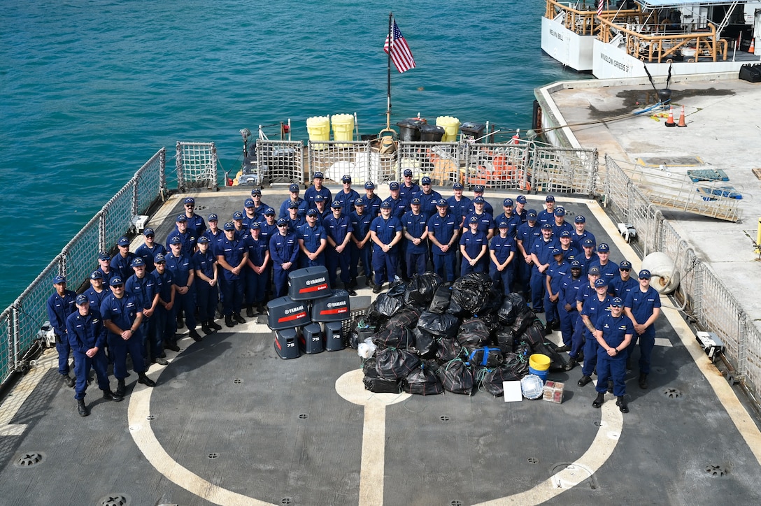 Coast Guard Cutter Tampa’s (WMEC 902) crew poses for a group photo during a drug offload at U.S. Coast Guard Base Miami Beach, Florida, April 16, 2026. Tampa’s crew offloaded nearly $28.7 million in illicit narcotics interdicted in international waters of the Eastern Pacific Ocean. (U.S. Coast Guard photo by Petty Officer 3rd Class Reese Hindmarsh)