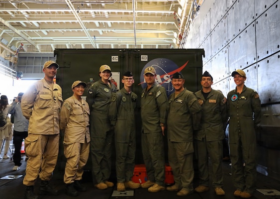 After supporting the successful recovery of NASA’s Artemis II crew and the Orion spacecraft, U.S. Navy personnel, assigned to various expeditionary medicine teams, pose for a group photo aboard the amphibious transport dock USS John P. Murtha (LPD 26), April 11. The teams, which included En-Route Care System (ERCS) 2, 3, and 11, and Expeditionary Resuscitative Surgical System 14 (ERSS), comprised personnel from Navy Medicine commands and military medical treatment facilities across the Pacific Rim.