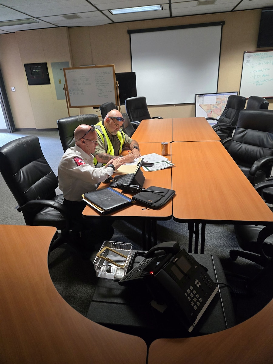 Emergency management personnel coordinate response efforts inside the Emergency Operations Center during a joint exercise with the City of San Angelo at Mathis Field, San Angelo Regional Airport, San Angelo, Texas, April 15, 2026. The EOC played a key role in managing communication and resource allocation throughout the scenario. (Courtesy Photo)