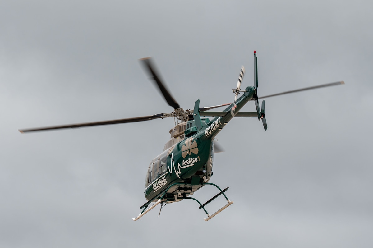 An AirMed helicopter departs after loading a simulated casualty during a joint emergency response exercise at Mathis Field, San Angelo Regional Airport, San Angelo, Texas, April 15, 2026. One participant was transported as part of the training scenario to enhance realism. (U.S. Air Force photo by Senior Airman James Salellas)