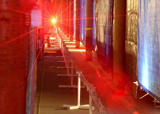 Laser propagation experiments performed by U.S. Naval Research Laboratory scientists in the Naval Surface Warfare Center-Carderock Division’s David Taylor Model Basin Facility, Bethesda, Maryland. Researchers created very strong atmospheric turbulence conditions over an 800m range to study how high-intensity laser light propagates. The work supports directed energy efforts in the Navy. (U.S. Navy photo)