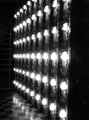 The condenser bank of the Pharos theta-pinch device, an early fusion research machine developed by the U.S. Naval Research Laboratory in the 1960s, is shown in this archival image. The system was used to study high-temperature plasma behavior and helped lay the foundation for modern fusion and pulsed-power research. (U.S. Navy photo)