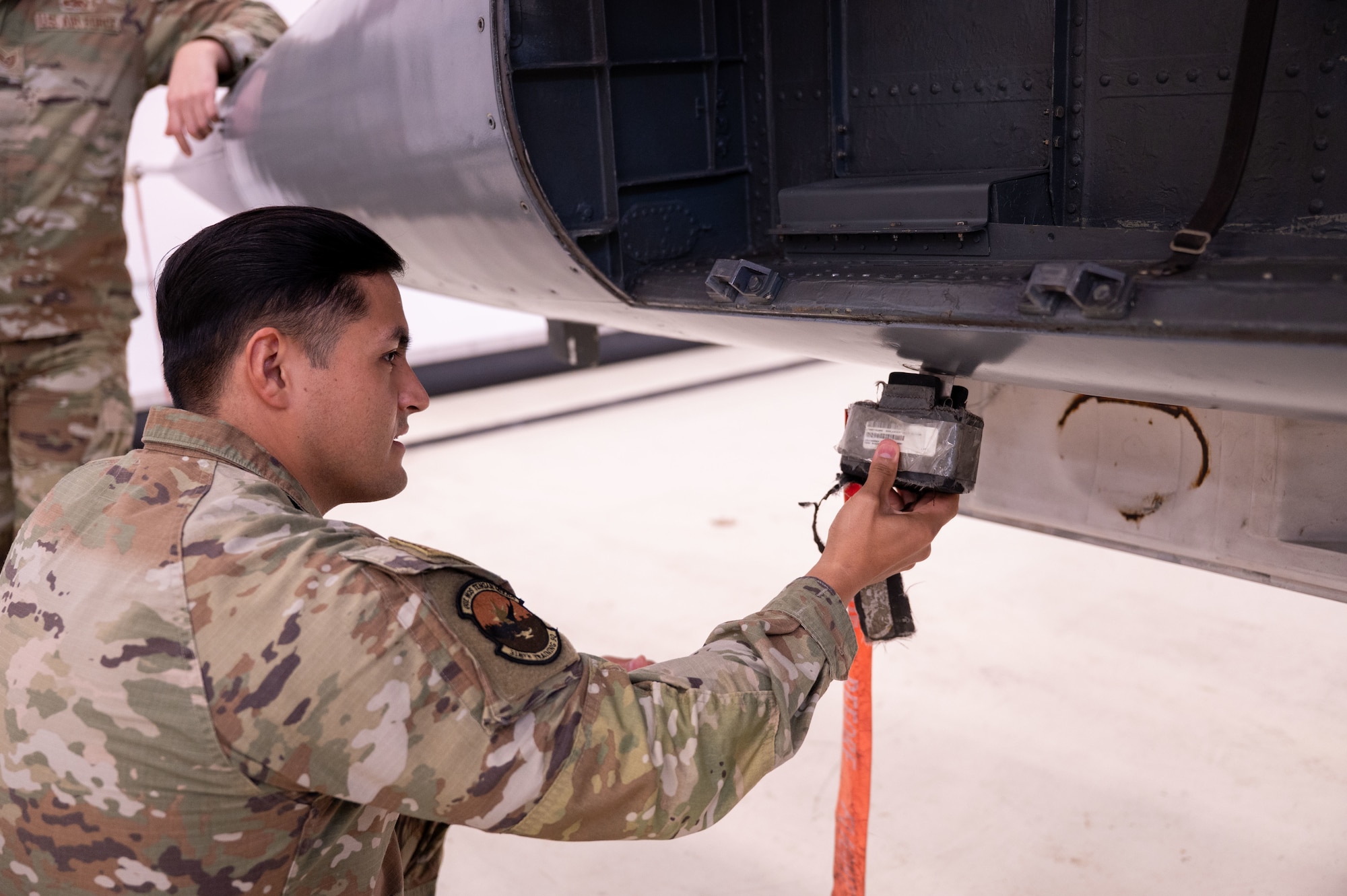 Tech. Sgt. Erik Garduno inspected the total temperature probe of F-5 at the Inter-American Air Forces Academy, Feb. 17, 2026, at Joint Base San Antonio-Lackland, Texas. IAAFA recently conducted an advanced aircraft systems maintenance course on the F-5 to members of the Royal Thai Air Force in Thailand. It was the first time in its 83-year history that IAAFA provided training to the Royal Thai Air Force. IAAFA is aligned under the 37th Training Wing and provides instruction in professional military education and leadership, aircrew training and technical courses in Spanish. (U.S. Air Force photo by Vanessa R. Adame)