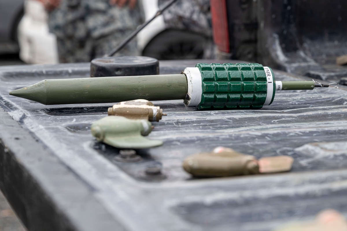Simulated explosives sit on display for participants to study during a joint bilateral K-9 exercise at Misawa Air Base, Japan, April 7, 2026.