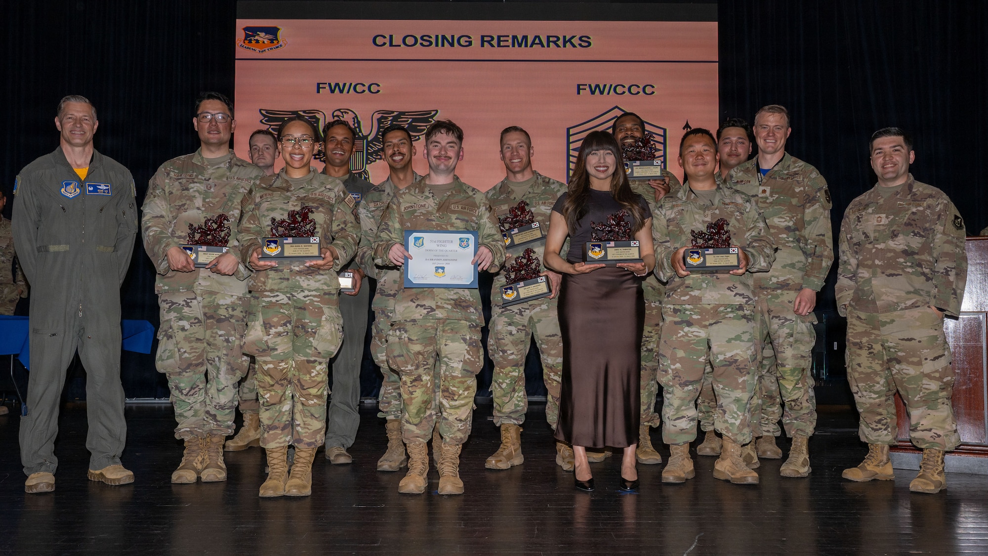 Winners of the 51st Fighter Wing First Quarter Awards Ceremony pose for a group photo with wing leadership at Osan Air Base, Republic of Korea, April 17, 2026. The 51st FW regularly celebrates the outstanding achievements of its top performing Airmen, encouraging excellence through recognition and awards. (U.S. Air Force photo by Senior Airman Rome Bowermaster)