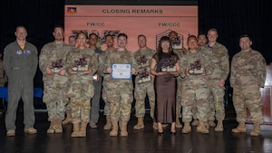 Winners of the 51st Fighter Wing First Quarter Awards Ceremony pose for a group photo with wing leadership at Osan Air Base, Republic of Korea, April 17, 2026. The 51st FW regularly celebrates the outstanding achievements of its top performing Airmen, encouraging excellence through recognition and awards. (U.S. Air Force photo by Senior Airman Rome Bowermaster)