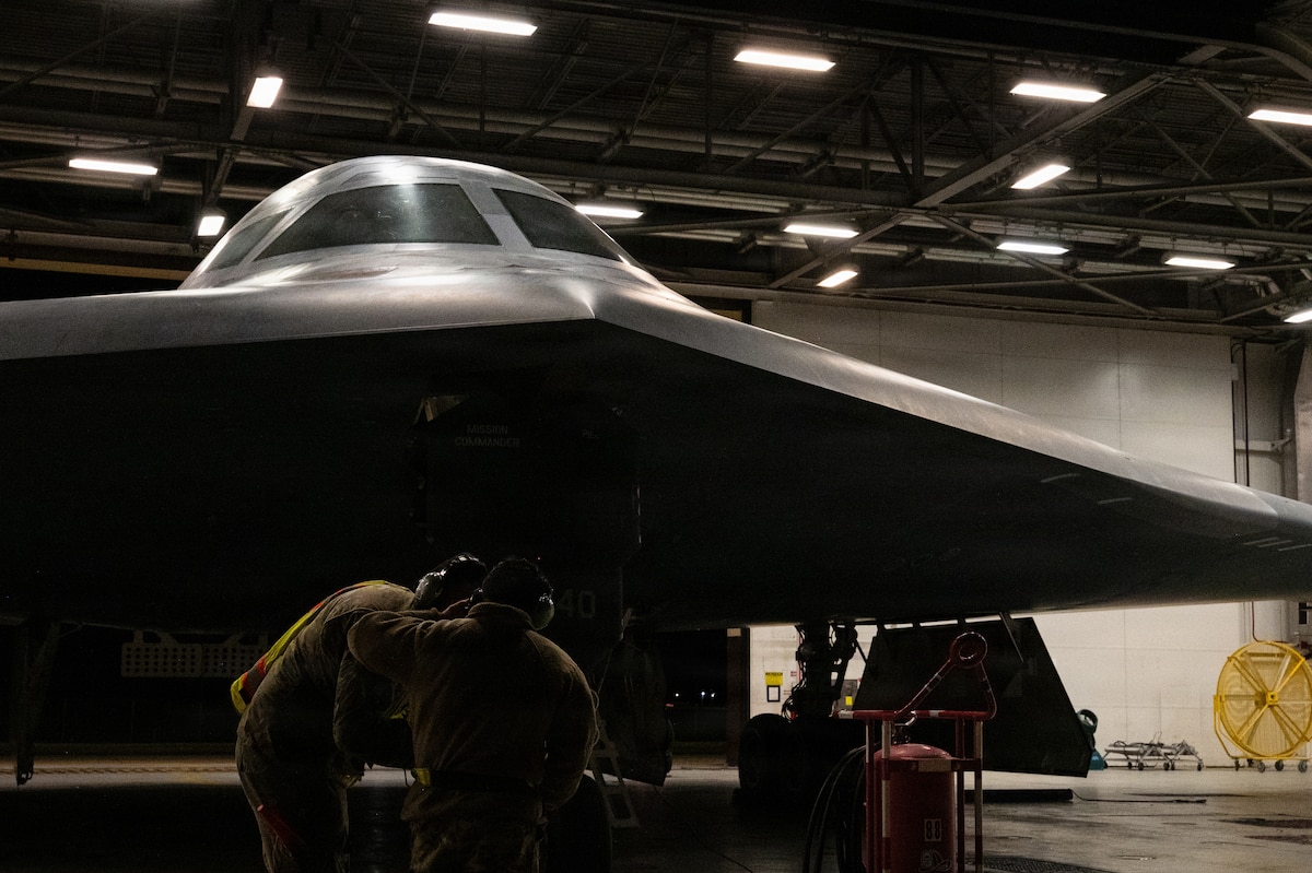 U.S. Air Force Airmen conduct preflight operations prior to a B-2 Spirit stealth bomber departure in the U.S. Strategic Command area of responsibility in support of Operation Epic Fury, March 29, 2026. The B-2 provided long-range precision strike capabilities, allowing it to penetrate contested environments and hold high-value targets at risk. (U.S. Air Force photo)