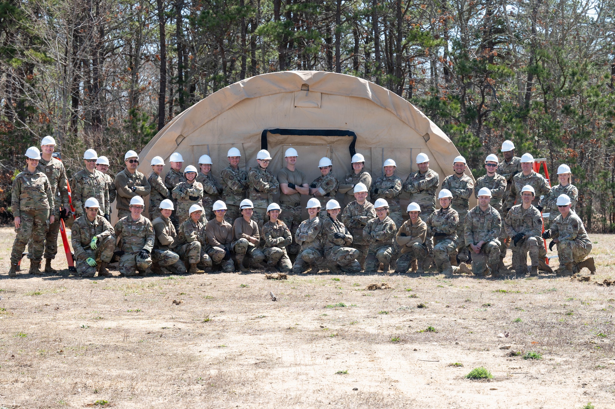 Airmen pose for a group photo.