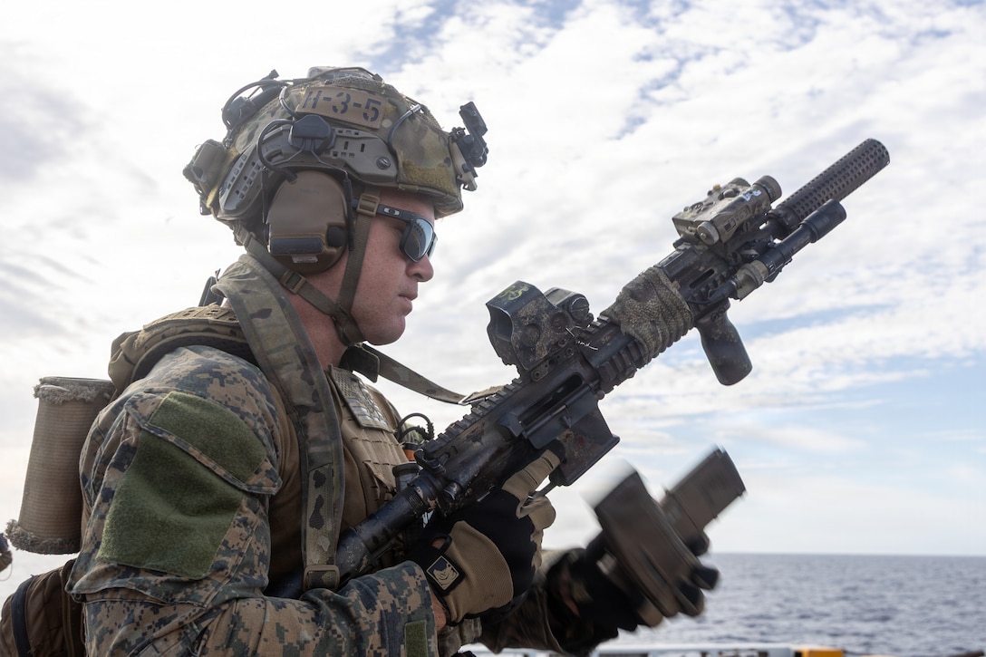 A U.S. Marine with Maritime Special Purpose Force, 22nd Marine Expeditionary Unit (Special Operations Capable), conducts a tactical reload during a deck shoot aboard San Antonio-class amphibious transport dock USS Fort Lauderdale (LPD 28), while underway in the Caribbean Sea, April 3, 2026. U.S. military forces are deployed to the Caribbean in support of the U.S. Southern Command mission, Department of War-directed operations, and the president’s priorities to disrupt illicit drug trafficking and protect the homeland. (U.S. Marine Corps photo)
