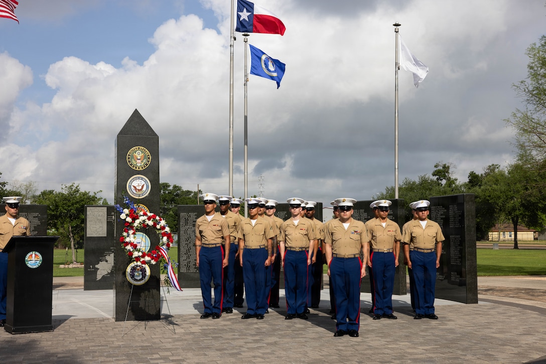 U.S. Marines with Marine Wing Support Squadron (MWSS) 272, Marine Air Control Group 28, 2nd Marine Aircraft Wing, stand in formation during a wreath-laying ceremony in Houston, Texas, April 15, 2026. Held in partnership with Freedom 250, the inaugural Fleet Week Houston commemorates the 250-year legacy of America while showcasing its sea service’s cutting-edge technology and the unwavering dedication of our warfighters.  (U.S. Marine Corps photo by Lance Cpl. Orlanys Diaz Figueroa)