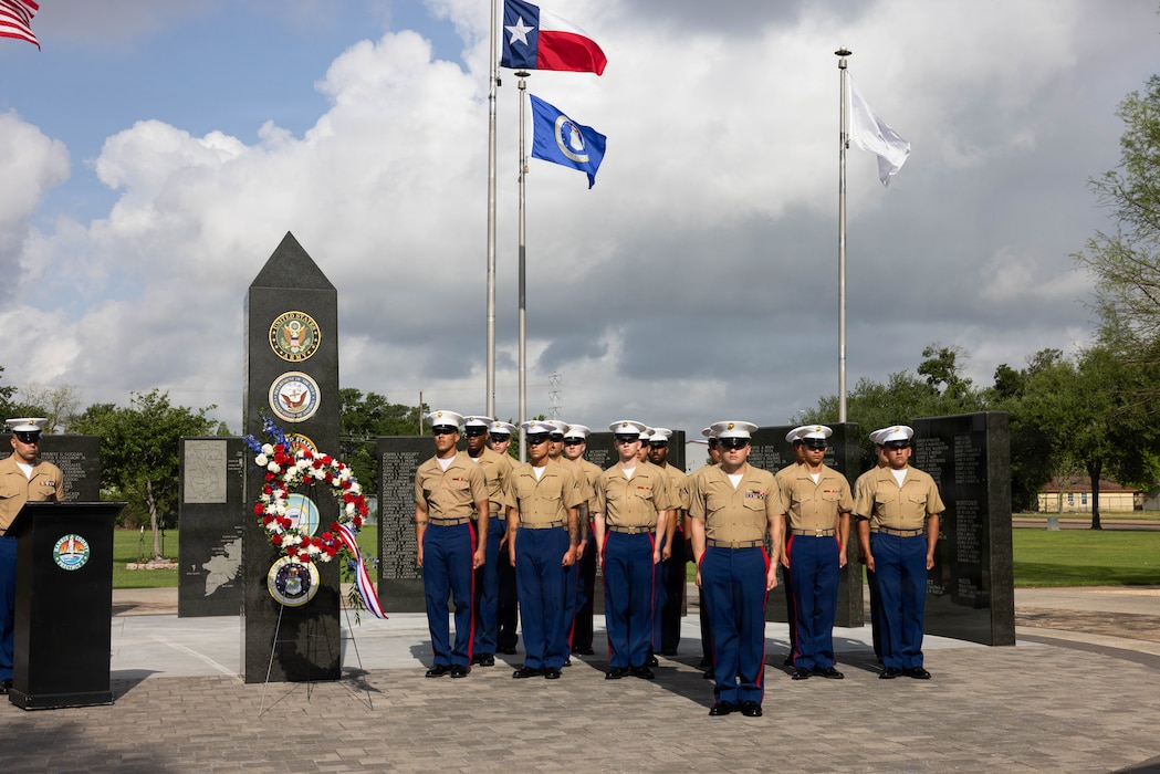 U.S. Marines with Marine Wing Support Squadron (MWSS) 272, Marine Air Control Group 28, 2nd Marine Aircraft Wing, stand in formation during a wreath-laying ceremony in Houston, Texas, April 15, 2026. Held in partnership with Freedom 250, the inaugural Fleet Week Houston commemorates the 250-year legacy of America while showcasing its sea service’s cutting-edge technology and the unwavering dedication of our warfighters.  (U.S. Marine Corps photo by Lance Cpl. Orlanys Diaz Figueroa)