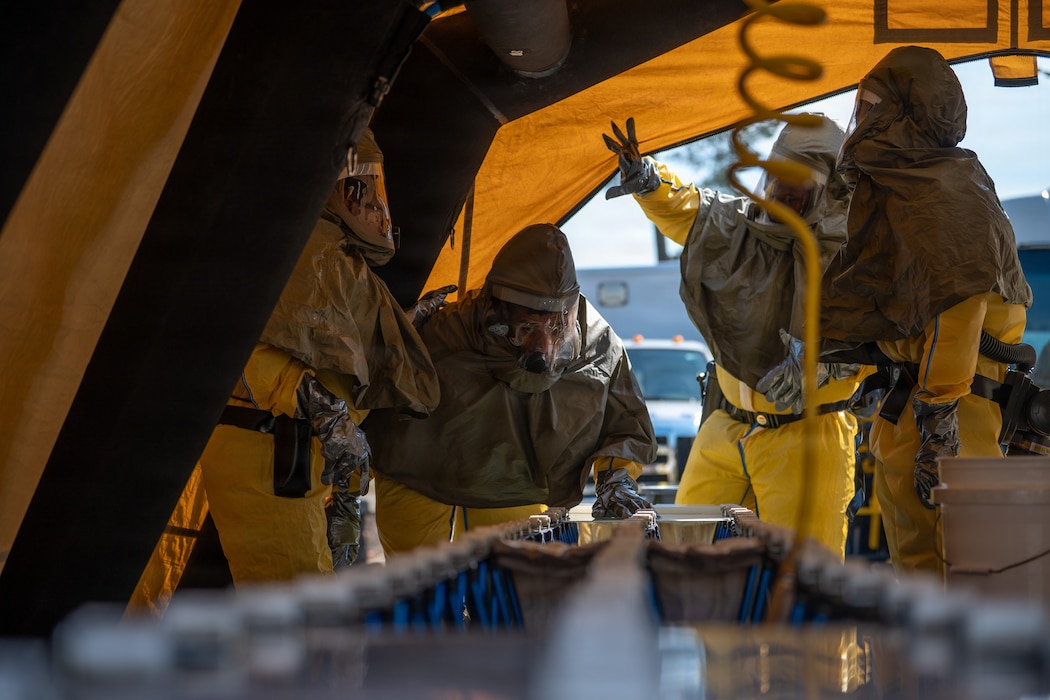 U.S. Air Force and U.S. Army service members prep to decontaminate simulated patients during a mass casualty exercise at Ramstein Air Base, Germany, April 15, 2026.