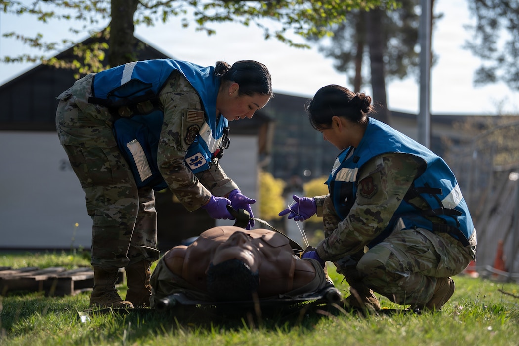 U.S. Air Force Airmen assigned to the 86th Medical Group triage a medical mannequin during a mass casualty exercise at Ramstein Air Base, Germany, April 15, 2026.