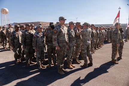 U.S. Army Soldiers attached to the 1st Battalion, 221st Cavalry, B Company, receive their blue cord during a "Turning Blue" ceremony at the Clark County Armory in Las Vegas, Nevada, April 12, 2026.