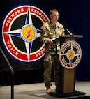 Col. Kevin Consedine, commander of Corpus Christi Army Depot, speaks during an Industry Day presentation at the AAAA Warfighting Summit in Nashville, Tennessee, highlighting the depot’s aviation sustainment capabilities and partnership opportunities with industry.