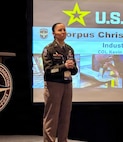 Maj. Gen. Lori Robinson, commander of the U.S. Army Aviation and Missile Command, delivers opening remarks at an Industry Day session during the AAAA Warfighting Summit in Nashville, Tennessee, emphasizing collaboration between the Army and industry partners.