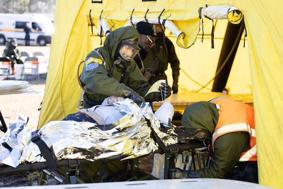 Service members from the Georgia National Guard participate in the Homeland Response Force External Evaluation at Fort Stewart, Georgia, Feb. 6, 2024. Guardsmen from multiple units along with civilians from across the state participated in the multi-day evaluation that tests their efficiency and capabilities to respond during a mass casualty event that can include natural disasters and chemical warfare attacks. (Air National Guard photo by Master Sgt. Jeff Rice)