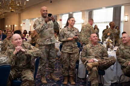 Airmen with the 11th Wing show support for the award winners at the Air Force District of Washington annual awards ceremony at Joint Base Anacostia-Bolling, Washington, D.C., April 9, 2026. The ceremony highlighted members across AFDW for their mission accomplishments throughout the year. (U.S. Air Force photo by Airman 1st Class Arlene Carrara)