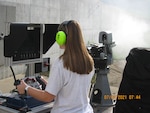 Kiara Streepy, a Mechanical Engineer at NSWC Crane who supports the ROSAM weapon system, conducts testing in 2021.