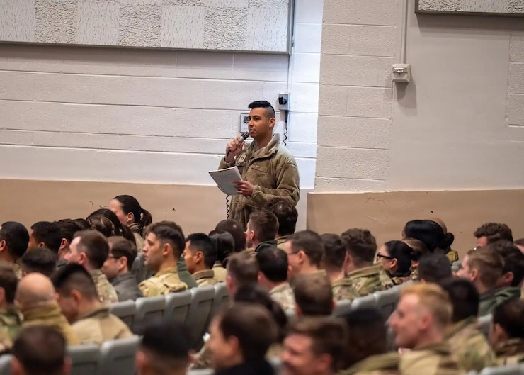 A student from the Squadron Officer School asks a question during a feedback session hosted by U.S. Air Force Lt. Gen. Dan Tulley, Air University commander and president, and Chief Master Sgt. Raun Howell, Air University command chief, at Maxwell Air Force Base, Alabama, Feb. 2, 2026.