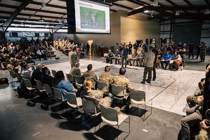 Oklahoma National Guard members and partner agencies conduct a tabletop exercise before the execution of Exercise Lightning Strike at Camp Gruber Training Center, Oklahoma, April 14, 2026. The Oklahoma National Guard, in partnership with Oklahoma Office of Emergency Management, hosted Exercise Lightning Strike, a domestic exercise scenario of an EF5 tornado. At the center of the exercise is the integration of uncrewed aircraft systems (UAS) across various scenarios, enabling real-time data sharing, improved situational awareness and more effective coordination among participating agencies. Exercise Lightning Strike brings together a wide range of agencies to operate within a shared framework, reinforcing the Guard’s role in supporting civil authorities during domestic incidents and natural disasters. (Oklahoma National Guard photo by Sgt. Anthony Ackah-Mensah)