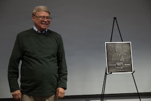 (Retired) U.S. Air National Guard Colonel William D. Peters Jr. stands proud after his induction into the Hall of Honor at the 130th Airlift Wing Headquarters building in Charleston, W. Va. on April 11, 2026. Peters was inducted for his exemplary service and advancement to state aviation, spanning over three decades in length. (U.S. Air National Guard photo by Tech. Sgt. Kelvin McConnell)
