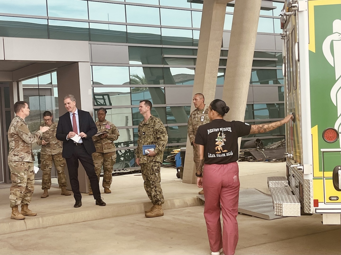 Assistant Secretary of War for Health Affairs, Honorable Keith Bass engages with Soldiers and medical personnel outside Weed Army Community Hospital.