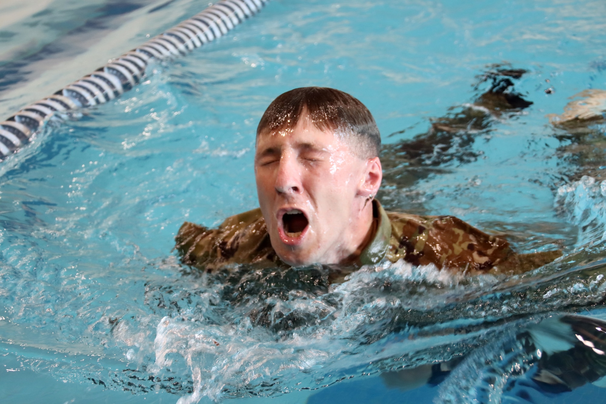 U.S. Army Reserve 1st Lt. David Grumhaus, military intelligence officer, Headquarters and Headquarters Company, 415th Civil Affairs Battalion, participates in a timed swimming event during the U.S. Army Reserve Command’s Interallied Confederation of Reserve Officers (CIOR) selection competition at Joint Base McGuire-Dix-Lakehurst, N.J., March 31, 2026.  Grumhaus was one of seven officers and five noncommissioned officers selected from the competition, held March 30 - April 3, to represent the United States this summer in Europe at the 2026 CIOR Military Competition, where reserve forces from NATO nations will compete in challenges that test teamwork, endurance and combat skills. (U.S. Army photo by Steven Roussel)