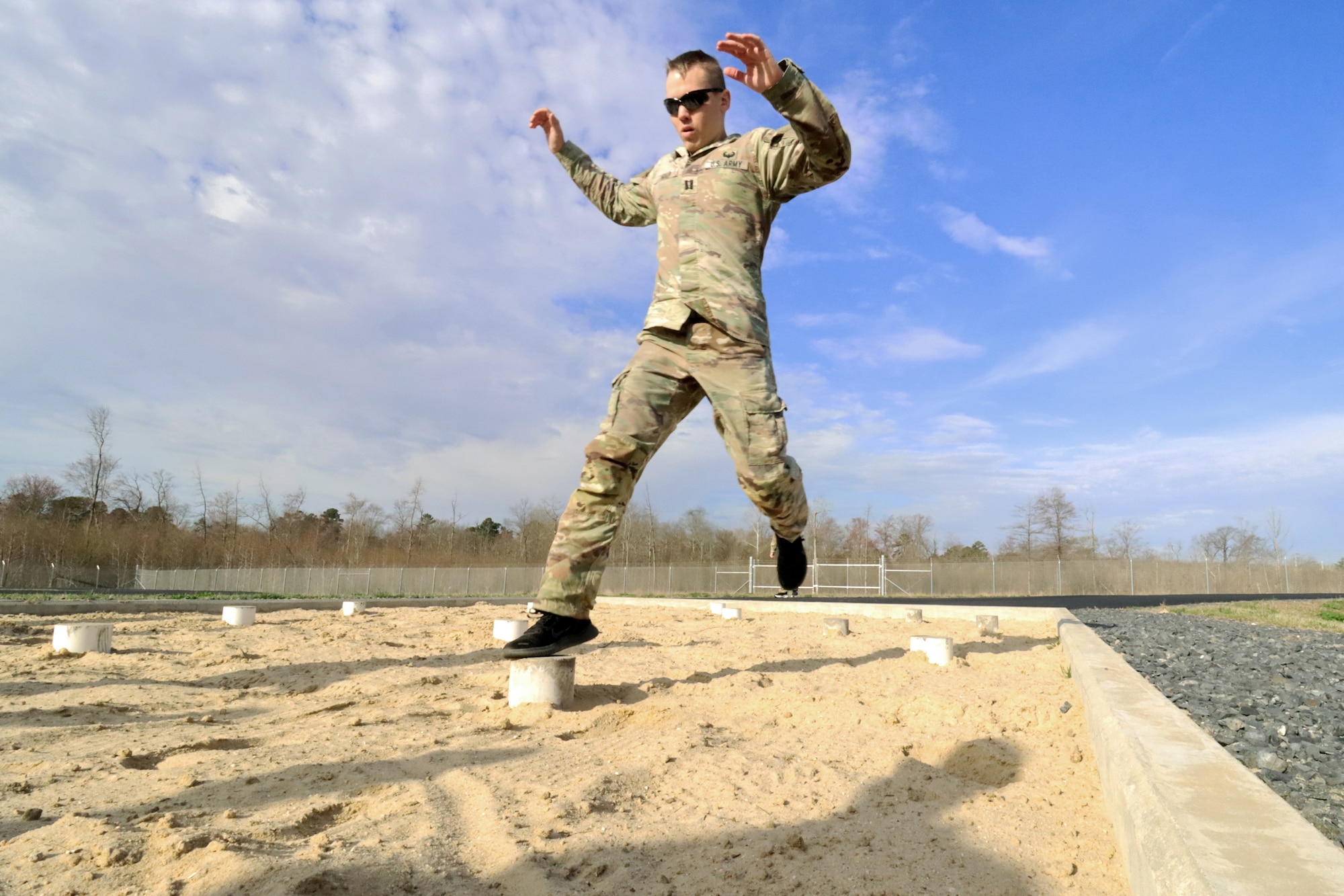 U.S. Army Reserve Capt. Brandon Walp, movements officer, 257th Movement Control Battalion, negotiates an obstacle on the NATO obstacle course during the U.S. Army Reserve Command (USARC) Interallied Confederation of Reserve Officers (CIOR) selection competition at Joint Base McGuire-Dix-Lakehurst, N.J., April 1, 2026. Walp was one of seven officers and five noncommissioned officers selected from the competition, held March 30 - April 3, to represent the United States this summer in Europe at the 2026 CIOR Military Competition, where reserve forces from NATO nations will compete in challenges that test teamwork, endurance and combat skills. (U.S. Army photo by Steven Roussel)