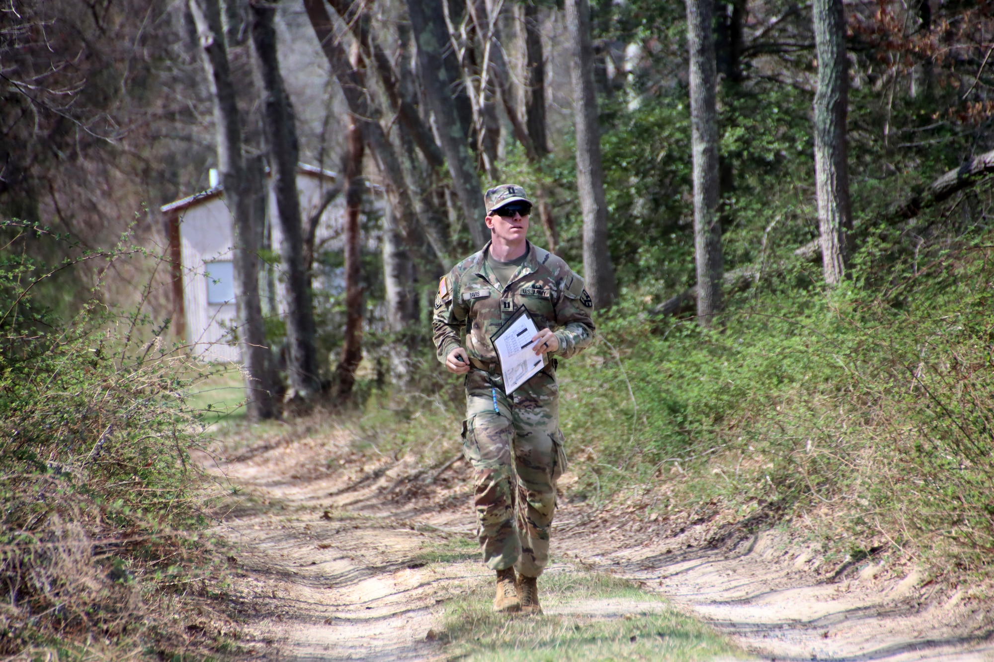 U.S. Army Reserve Capt. Tyler Davis, force protection officer in charge and Holistic Health and Fitness System manager, Headquarters and Headquarters Company, 377th Theater Sustainment Command, moves to his next point during the land navigation event of the U.S. Army Reserve Command’s CIOR selection competition at Joint Base McGuire-Dix-Lakehurst, N.J., April 1, 2026. Davis was one of seven officers and five noncommissioned officers selected from the competition, held March 30 to April 3, to represent the United States this summer in Europe at the 2026 CIOR Military Competition, where reserve forces from NATO nations will compete in challenges that test teamwork, endurance and combat skills. (U.S. Army photo by Steven Roussel)