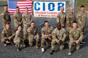 U.S. Army Reserve Soldiers competing in the U.S. Army Reserve Command’s Interallied Confederation of Reserve Officers (CIOR) selection competition, pose for a group photo at the NATO obstacle course at Joint Base McGuire-Dix-Lakehurst, N.J., April 1, 2026. Seven officers and five noncommissioned officers were selected from the competition, held March 30 - April 3, to represent the United States this summer in Europe at the 2026 CIOR Military Competition, where reserve forces from NATO nations will compete in challenges that test teamwork, endurance and combat skills. (U.S. Army photo by Steven Roussel)