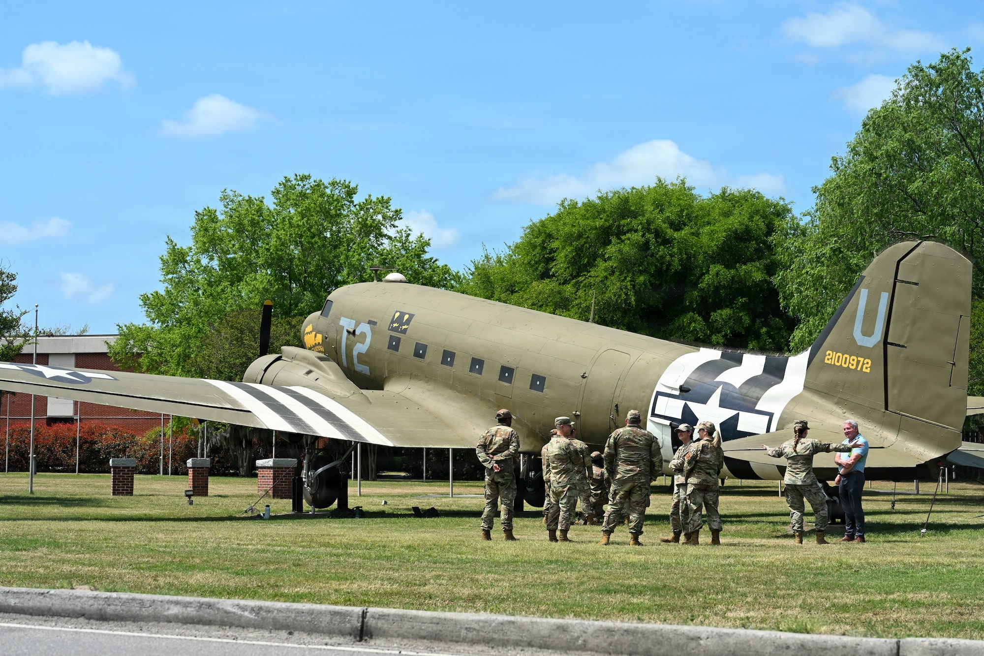 A photo of Airmen repairing a static C-47 Skytrain.