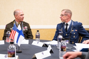 Lt. Gen. Richard Zellmann, U.S. Space Command deputy commander, speaks with Maj. Gen. Timo Herranen, Finnish Air and Space Force commander, at the 41st annual Space Symposium in Colorado Springs, Colorado, April 15, 2026. The leaders discussed the vital role that space plays in modern military activities, including satellite communications and battlespace awareness, and explored opportunities for potential collaboration in the future. USSPACECOM, working with allies and partners, plans, executes, and integrates military spacepower into multi-domain global operations in order to deter aggression, defend national interests, and when necessary, defeat threats.