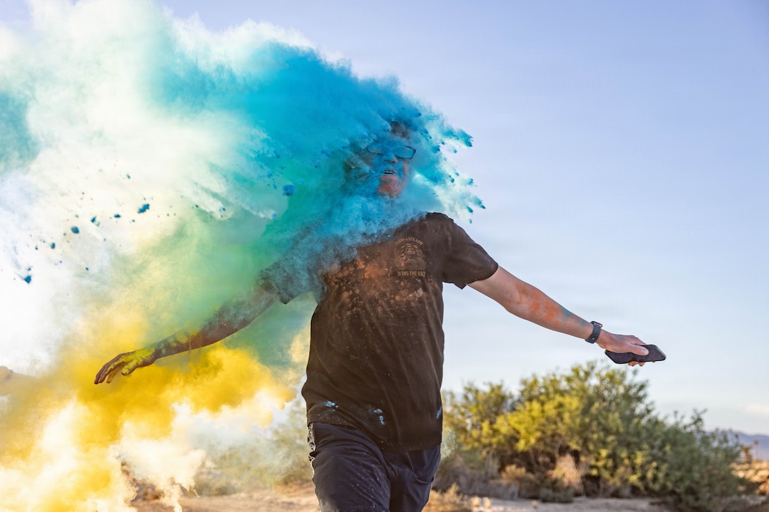 A participant in the Colorful Consent 5K run gets covered in chalk at Del Valle Field, Marine Corps Air Ground Combat Center, Twentynine Palms, California, April 10, 2026. In recognition of Sexual Assault Awareness and Prevention Month, the Combat Center hosted a 5K color run, organized by Semper Fit, to promote education and support for sexual assault prevention. (U.S. Marine Corps photo Lance Cpl. Cody Fitzgerald)