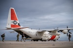 An HC-130 Hercules airplane crew assigned to U.S. Coast Guard Air Station Barbers Point in Kapolei, Hawaii, offloads personnel and supplies at the Francisco C. Ada/Saipan International Airport in I Fadang, Saipan, April 17, 2026. Coast Guard  aircrews transported personnel with FEMA, the U.S. Army Corps of Engineers, the Department of Public Health and Social Services, and the Department of War to Saipan in support of recovery efforts following Typhoon Sinlaku. (U.S. Coast Guard photo by Chief Petty Officer Corinne Zilnicki)