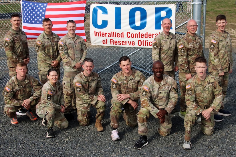 U.S. Army Reserve Soldiers competing in the U.S. Army Reserve Command’s Interallied Confederation of Reserve Officers (CIOR) selection competition, pose for a group photo at the NATO obstacle course at Joint Base McGuire-Dix-Lakehurst, N.J., April 1, 2026. Seven officers and five noncommissioned officers were selected from the competition, held March 30 - April 3, to represent the United States this summer in Europe at the 2026 CIOR Military Competition, where reserve forces from NATO nations will compete in challenges that test teamwork, endurance and combat skills. (U.S. Army photo by Steven Roussel)