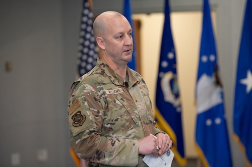 Image of a man addressing an audience