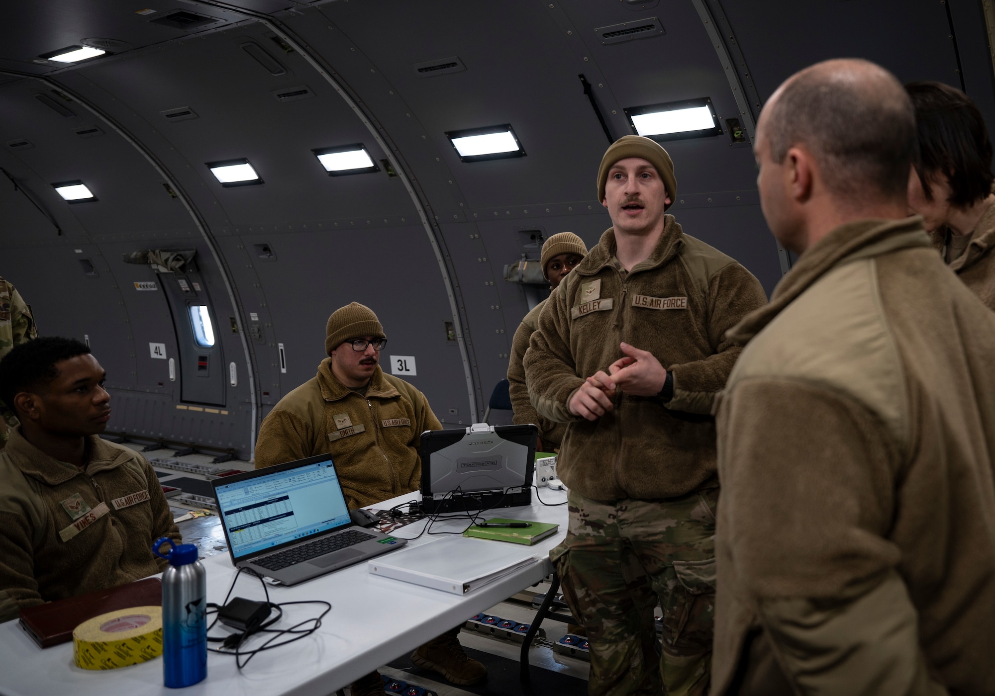U.S. Air Force Airman Jake Kelley, 87th Operational Medical Readiness Squadron bioenvironmental engineering technician, provides a risk assessment brief during Radiant Falcon training at Joint Base McGuire-Dix-Lakehurst, N.J., March 26, 2026.