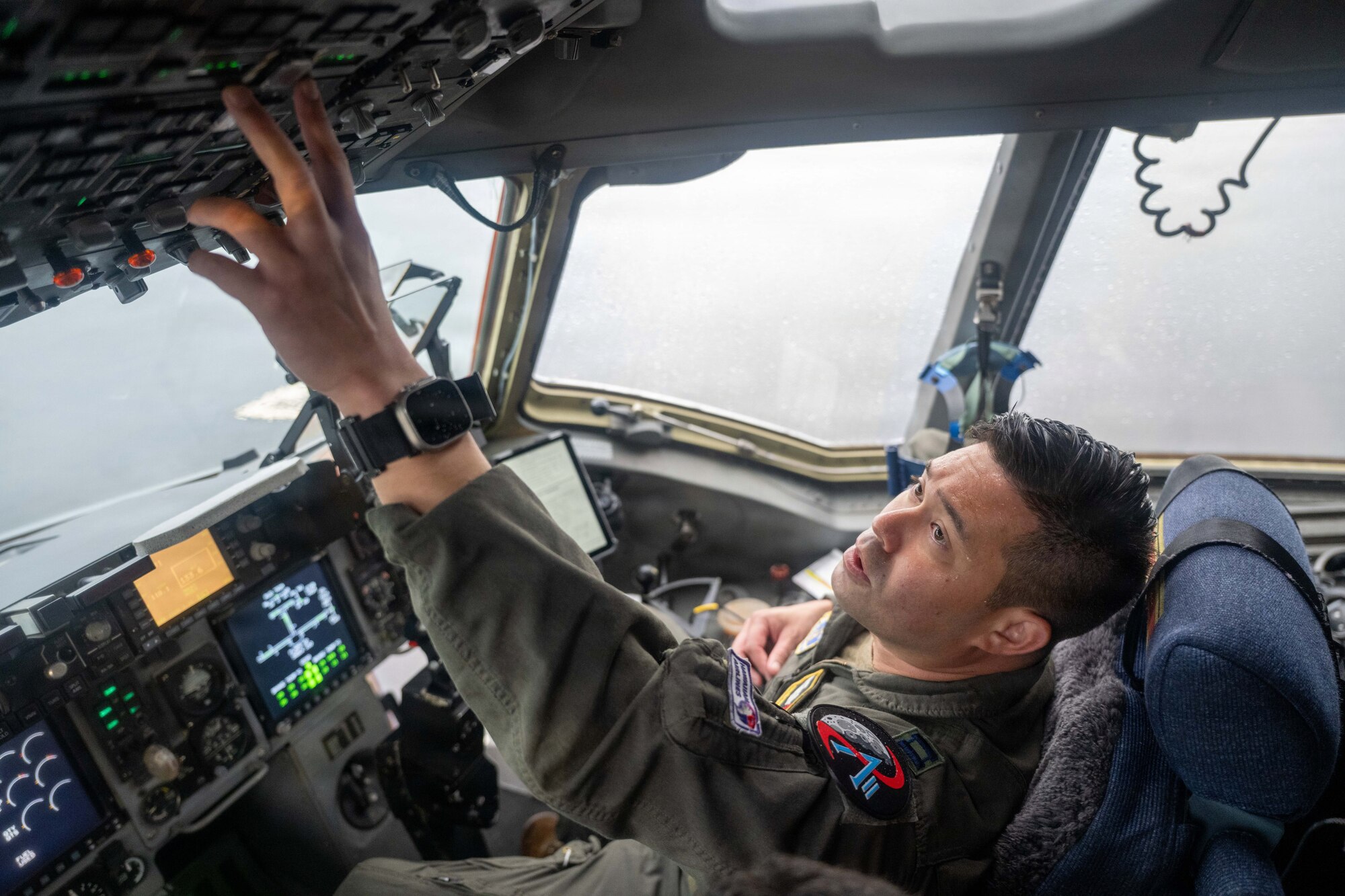 A U.S. Air Force pilot prepares a C-17 Globemaster III for takeoff.